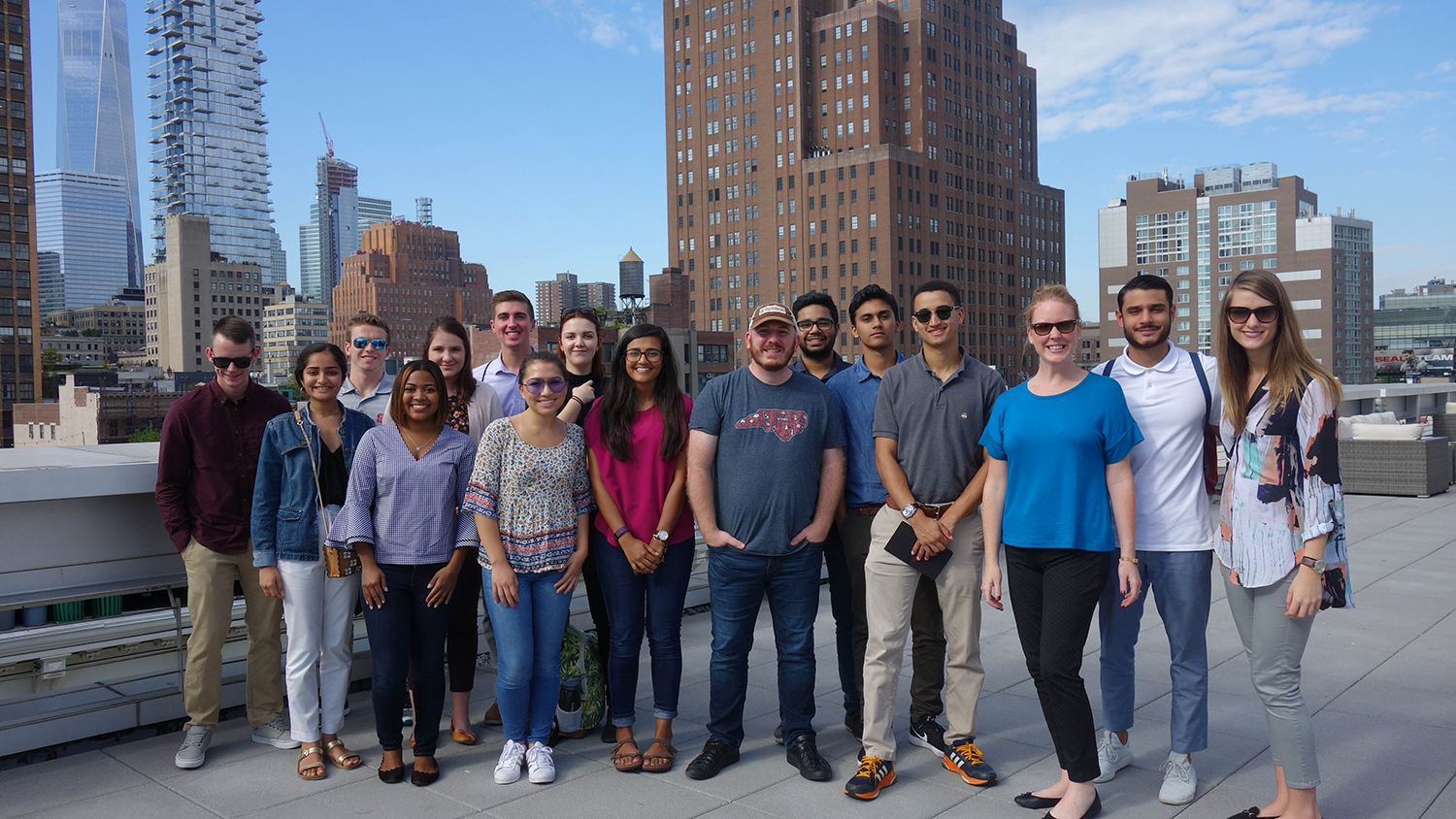 Group of Entrepenrship students smiling on rooftop in NYC