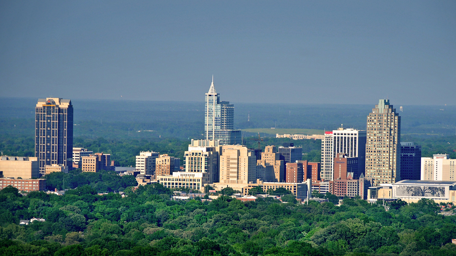 Aerial shot of Raleigh skyline on a sunny day
