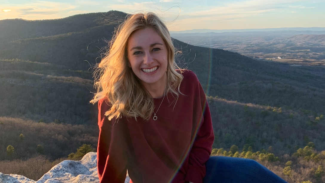 Portrait of Katie Lawson with mountains in background