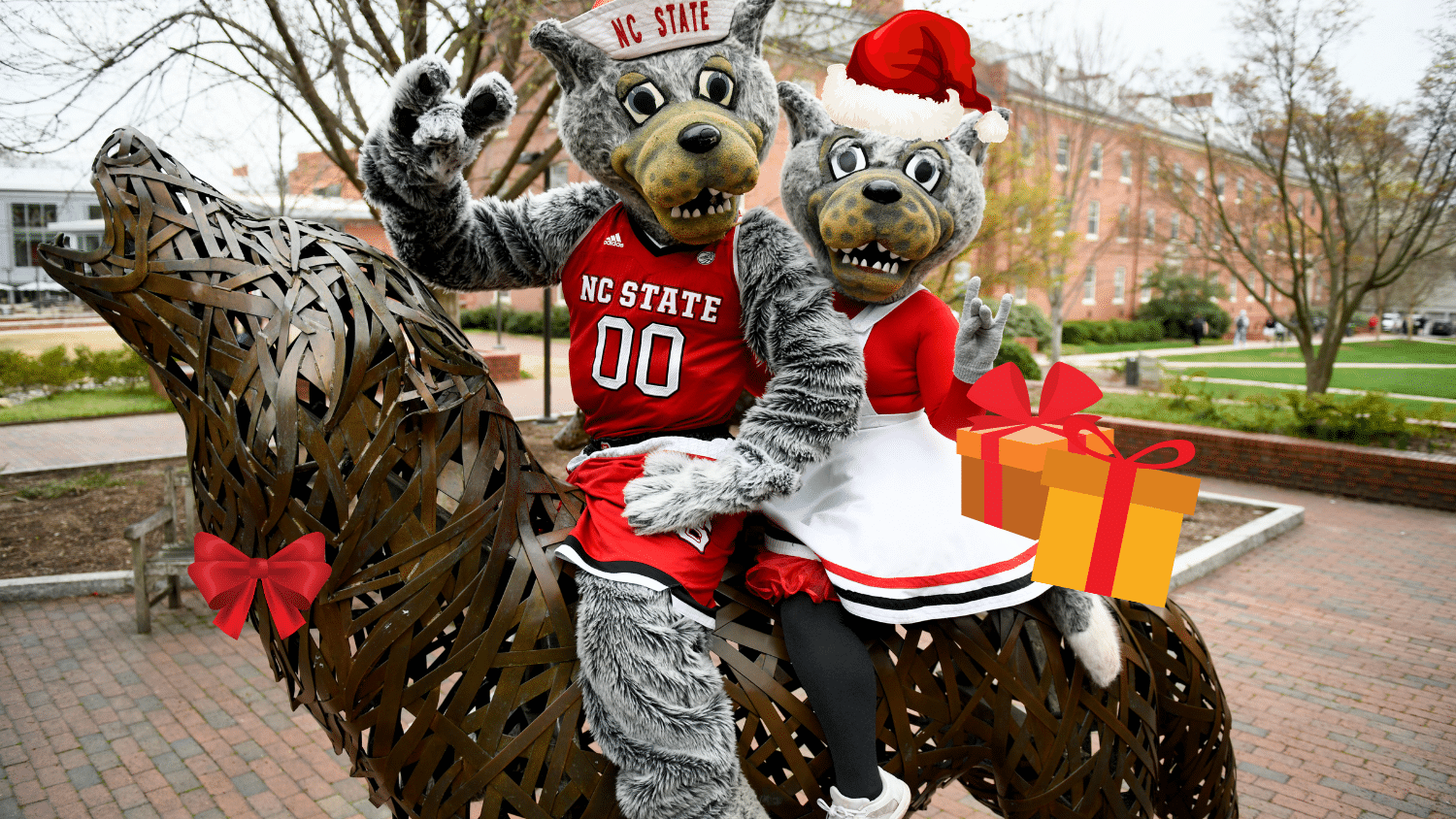 Holiday card with Mr and Mrs Wuf at the copper wolfs in wolf plaza.