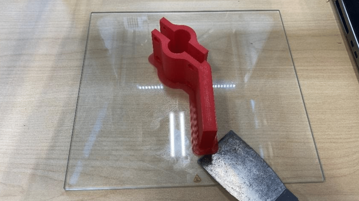 3D printed red no-touch door handle
