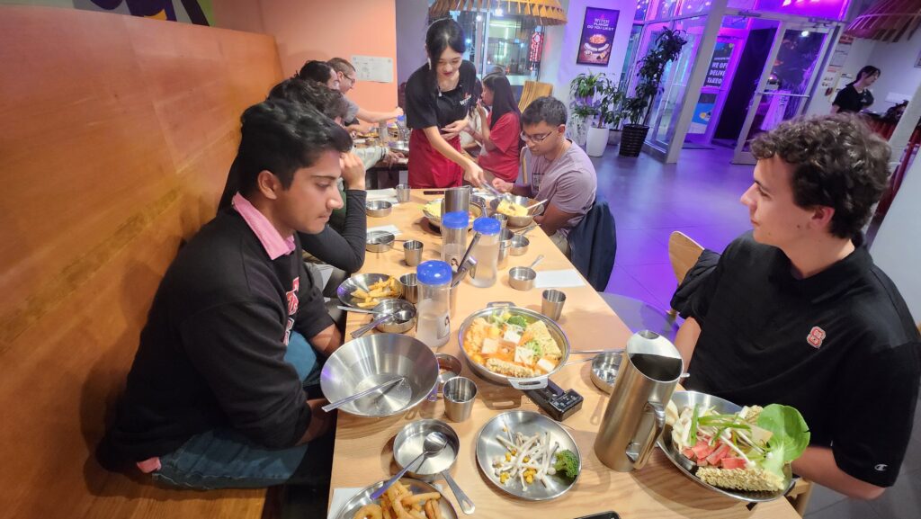 People eating hot pot